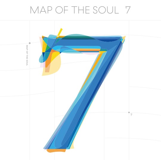 Capa do álbum "Map Of The Soul: 7" do BTS. A imagem é composta por um grande número sete azul com detalhes nas extremidades em amarelo, verde e laranja. O número sete está dentro de um gráfico de plano cartesiano, desenhado nos eixos x e y. Na parte superior da arte da capa do álbum, está escrito em cinza e em caixa alta o nome do disco, "Map Of The Soul: 7".