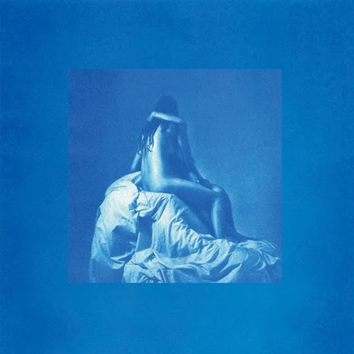 Capa da versão deluxe do álbum forevher, de Shura. Duas mulheres nuas se abraçam intimamente em cima de uma estrutura coberta por lenços, os rostos ocultos em um beijo. A figura é banhada numa luz azul com uma borda grossa de um azul mais claro.
