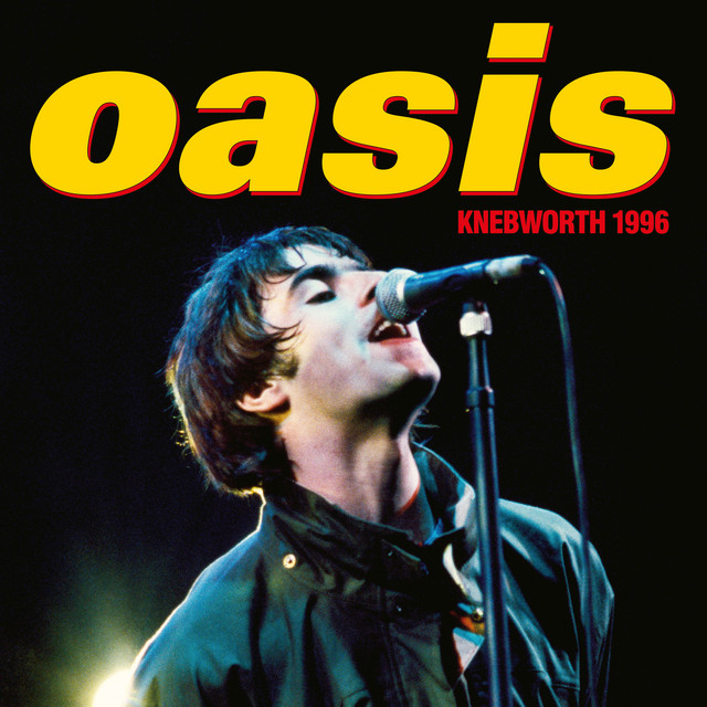 Capa da música Champagne Supernova Live at Knebworth, 11th August 1996. Na foto, Liam Gallagher está cantando, com o microfone de cor preta preso em um pedestal de cor preta. Ele veste uma jaqueta verde, possui cabelo liso de cor castanha, com franja, e é um homem branco. O fundo é preto, acima de sua cabeça está escrito Oasis, em fonte de cor amarela, e, logo abaixo, escrito Knebworth 1996, em fonte de cor vermelha.