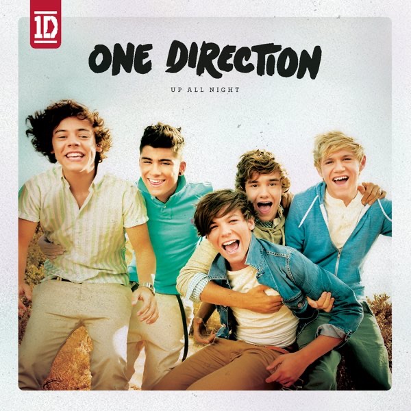 Capa do álbum Up All Night, do One Direction. A foto é quadrada, com uma borda branca e possui um aspecto amarelado. No canto superior esquerdo, está um adesivo vermelho escrito 1D em branco, com uma listra branca em cima e outra embaixo. Na parte superior, está escrito One Direction em letras pretas e maiúsculas. Abaixo, em tamanho menor, está escrito Up All Night em letras maiúsculas e pretas. Ocupando o centro da imagem, estão Harry, Zayn, Liam, Louis  e Niall, da esquerda para a direita. Harry é um homem de olhos claros e cabelos cacheados curtos. Ele veste uma camisa listrada branca e amarela e uma calça jeans bege. Ele está sorrindo e possui duas covinhas. Os dois braços estão à frente do corpo. Zayn é um homem com traços árabes, possui olhos e cabelos escuros, com corte estilo topete. Ele veste uma camisa azul piscina e uma calça bege. Zayn está sorrindo, com a língua entre os dentes e abraça Harry na cintura com o braço direito. Liam é um homem de cabelos castanhos claros e curtos ondulados. Ele veste uma camisa de moletom bege. Liam abraça Louis, que está em sua frente, com a mão direita no peito de Louis e também apoia a mão esquerda no ombro de Niall, ao seu lado. Louis é um homem de cabelos castanhos lisos. Ele veste uma camisa branca, uma calça bege e uma jaqueta jeans. Louis está levemente abaixado, sorrindo, sendo segurado por Niall e Liam. Niall é um homem de cabelos loiros curtos. Ele veste uma camisa branca, um moletom azul claro e uma calça jeans. O dia na foto está ensolarado e possui matas pequenas atrás dos integrantes. 