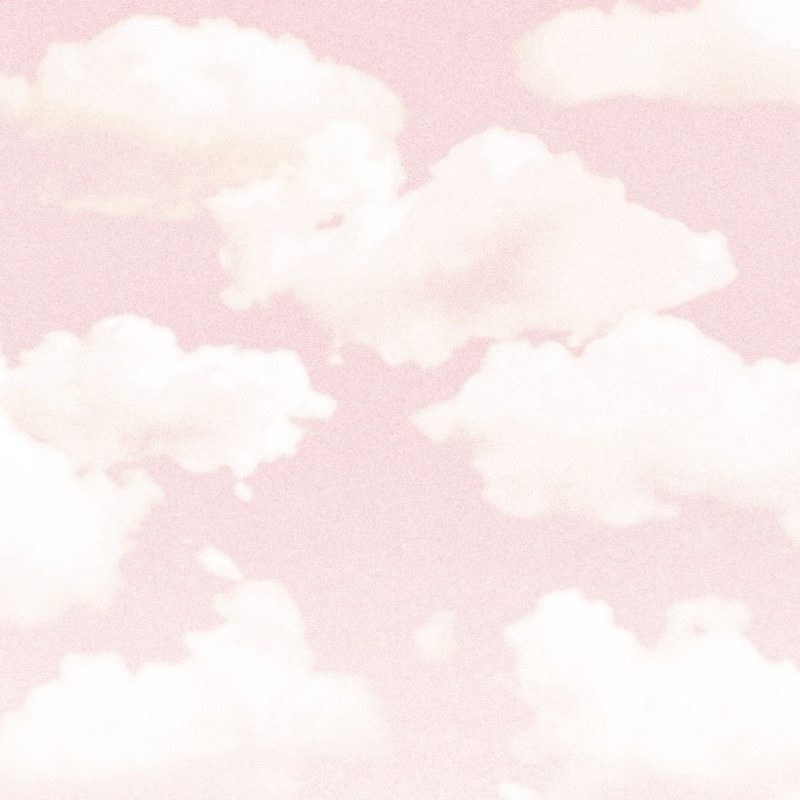 Capa do álbum GLOW ON da banda Turnstile. A imagem mostra um céu em tons de rosa com nuvens brancas esparsas.