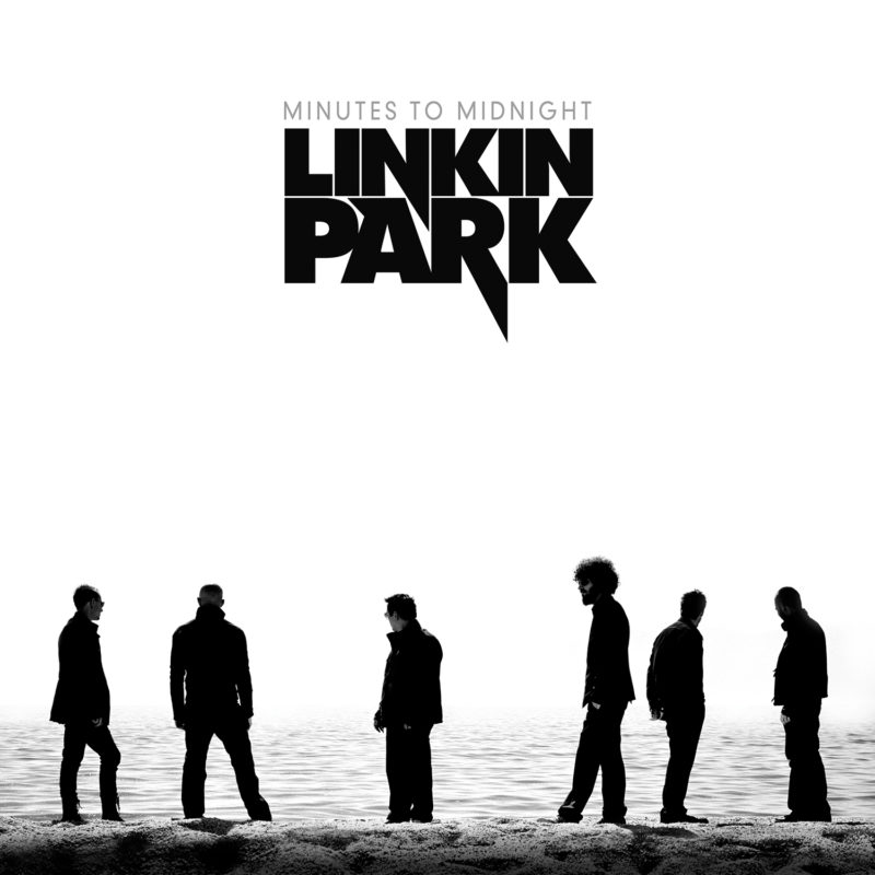 Capa do álbum Minutes to Midnight, da banda Linkin Park. Na parte inferior da capa, estão os seis integrantes, virados de costas e olhando para algum ponto à frente. Eles estão usando calças e jaquetas pretas. Por conta dos efeitos criados, é possível visualizar apenas as silhuetas deles. O cenário contém um mar ao fundo. Na parte superior, está escrito Linkin Park em letras pretas grossas e estilizadas, de maneira que se encaixam. Acima do nome da banda, está escrito o nome do álbum, em letras finas e num tom acinzentado. O álbum está em tons de preto e branco, fazendo a maioria do espaço da imagem ser branco, dando destaque para os integrantes e o que está escrito.