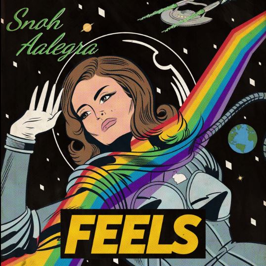 Capa do álbum de FEELS, é um design gráfico de uma mulher astronauta, que parece estar flutuando pelo espaço. Ela leva sua mão direita ao capacete. O desenho de um arco-íris atravessa o desenho na diagonal desde o canto inferior esquerdo ao canto superior direito