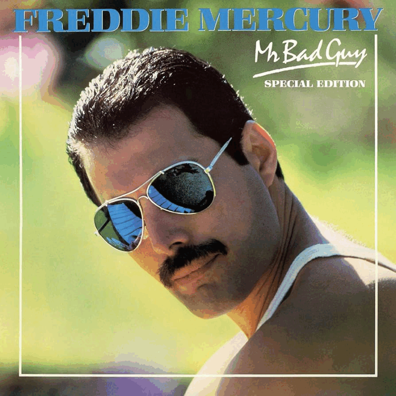 Capa de um álbum musical do artista Freddie Mercury, onde aparece de óculos escuros reflexivos e bigode, olhando por cima do ombro com expressão confiante. Ele está ao ar livre sob luz do sol, com fundo esverdeado desfocado. No topo, o nome do cantor é destacado em azul e o nome “Mr. Bad Guy (Special Edition)” é posto abaixo.