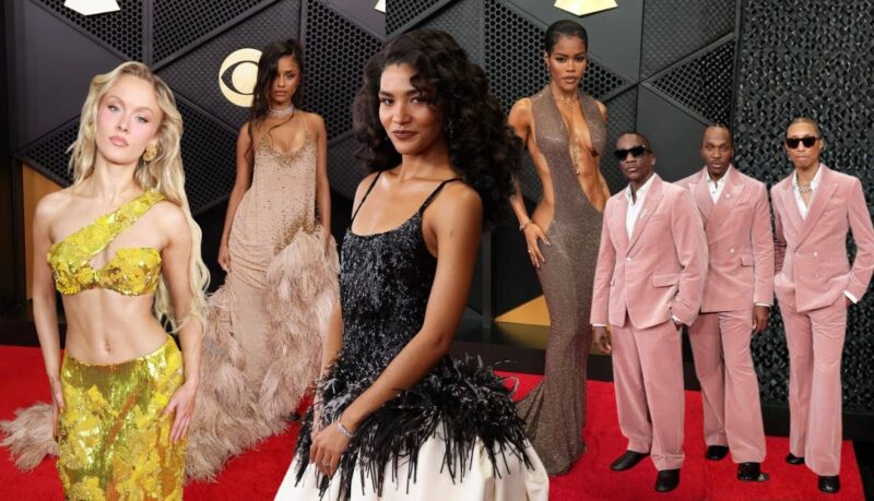 Uma montagem horizontal apresentando cinco registros de diferentes artistas no tapete vermelho. À esquerda, a cantora Zara Larsson posa com um conjunto amarelo de top e saia com bordados de flores em relevo. Ao seu lado, a artista Tyla aparece com um vestido bege de tecido fino e detalhes em rede, apresentando uma saia longa com acabamento de penas. No centro, em destaque, Olivia Dean sorri levemente usando um vestido preto texturizado com detalhes de penas na cintura e uma saia branca volumosa. À sua direita, Teyana Taylor posa com um vestido marrom metálico de grandes recortes laterais. No canto direito, um grupo de homens, incluindo Pharrell Williams, posa usando ternos de veludo em tons de rosa e lavanda.